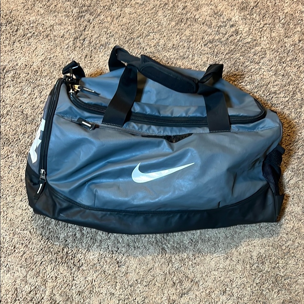 Nike Blue and Black Duffel Bag with Sporty Design